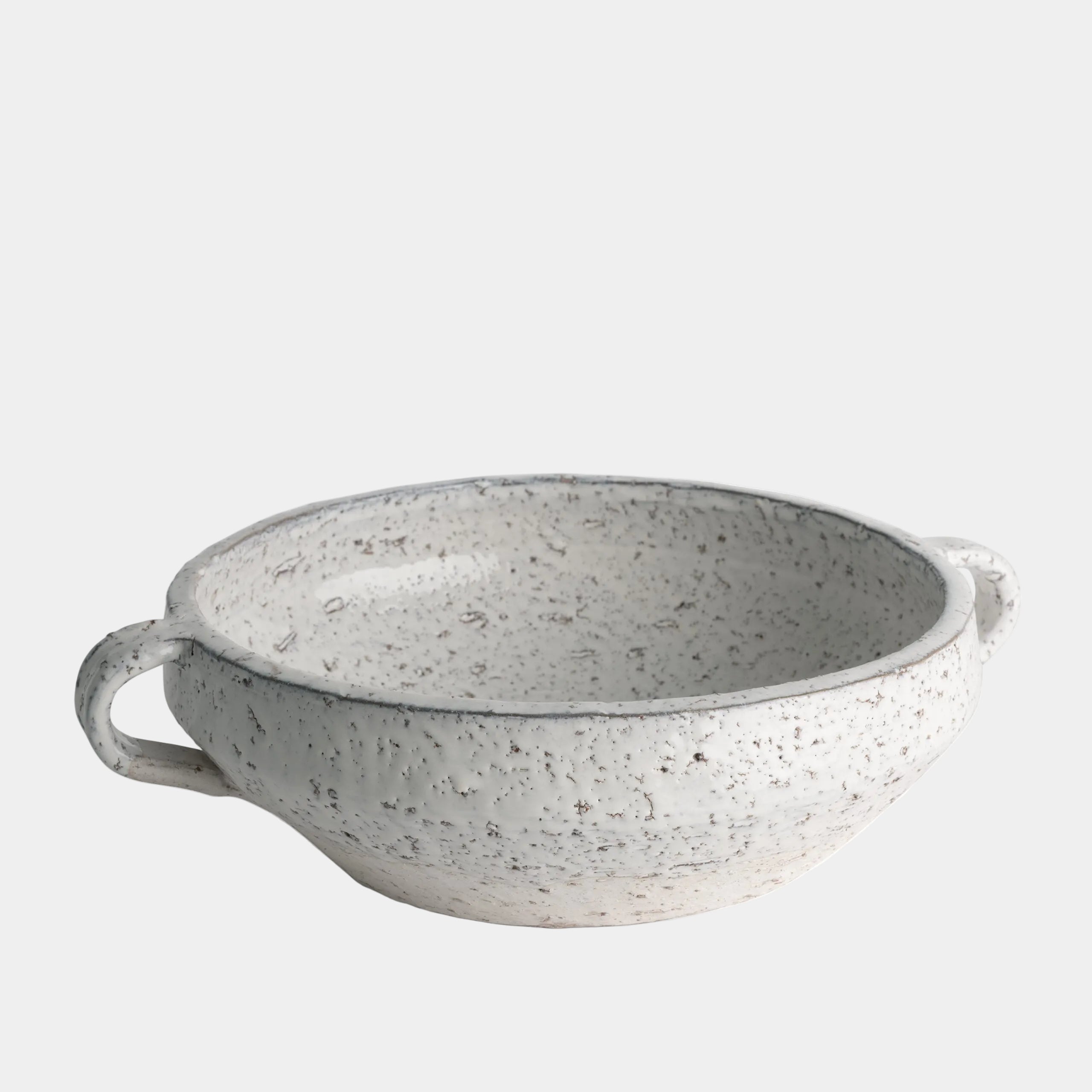 Speckled gray ceramic bowl with handles on a white background