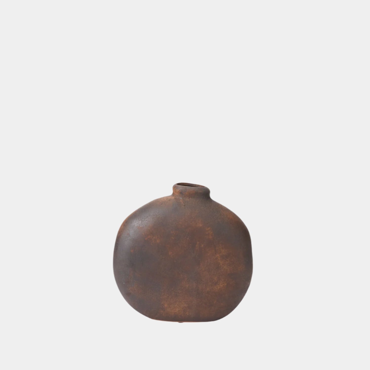 Rust-colored ceramic vase on a white background