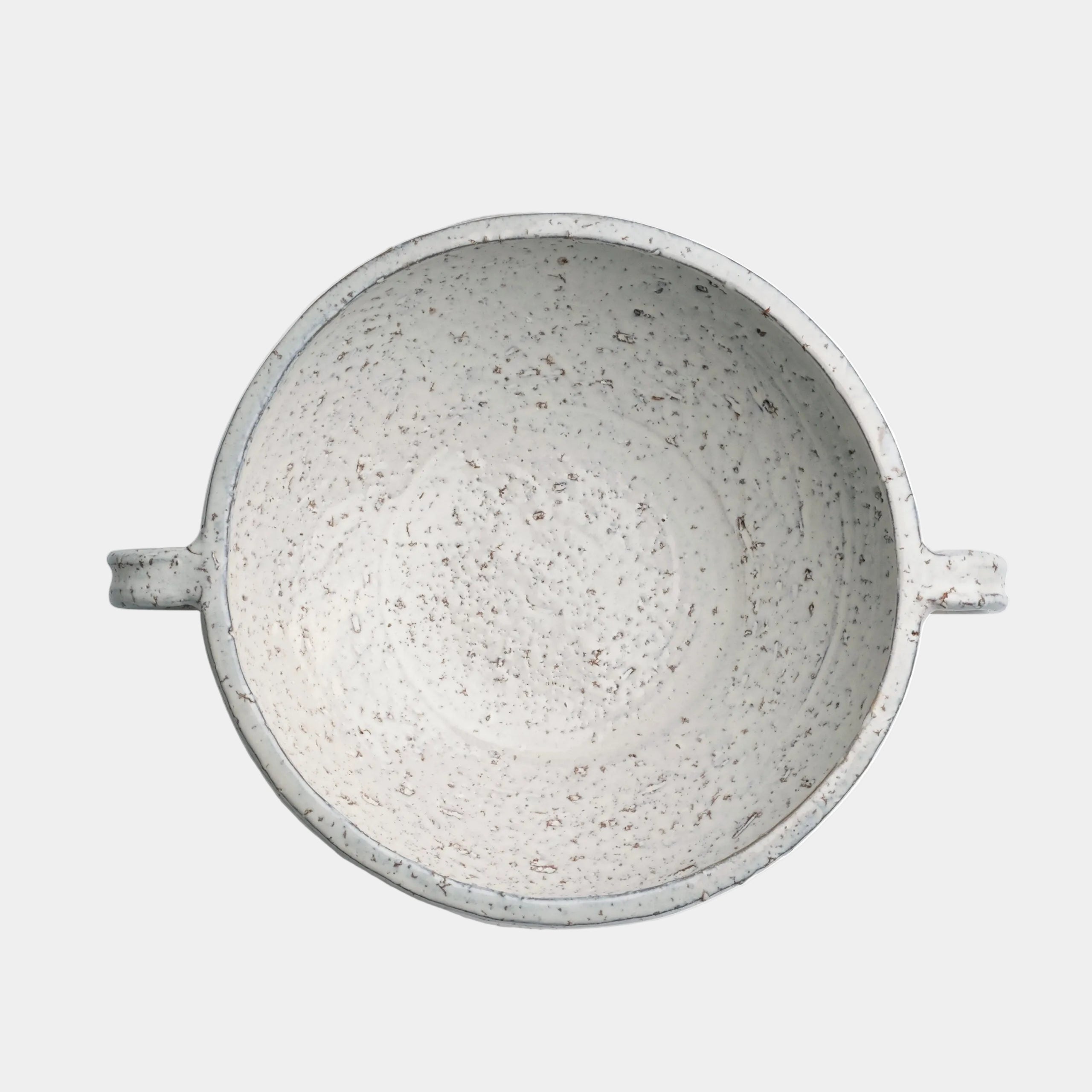 Speckled gray ceramic bowl with handles on a white background