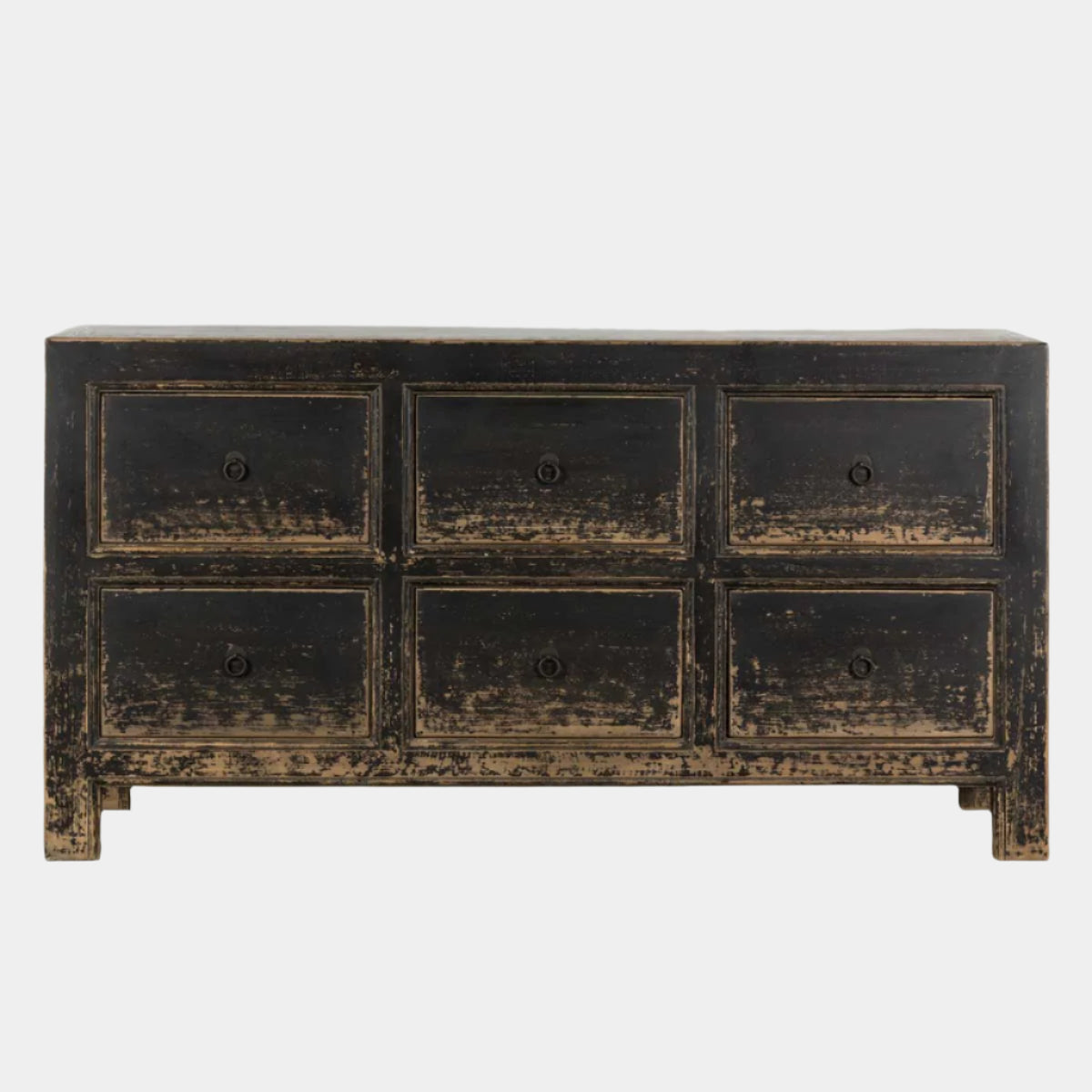 Distressed black wooden dresser with six drawers on a white background