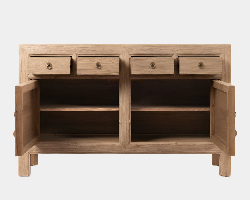 Wooden sideboard with open doors on a light wooden floor.