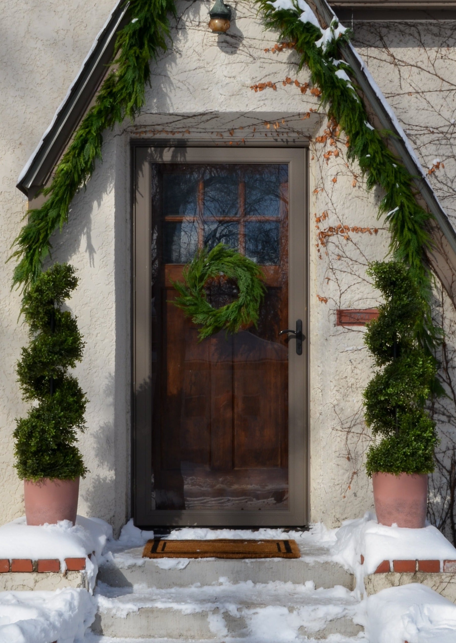 UV Treated Faux Indoor/Covered Outdoor Cedar Wreath - 24"